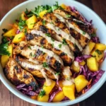 Jerk Chicken & Mango Slaw Bowls with Honey Lime Cream