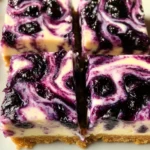 The Best Blueberry Swirl Cheesecake Bars